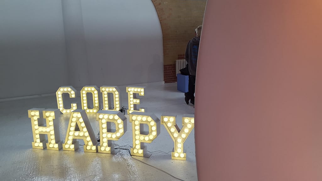 a banner showing 'code happy'