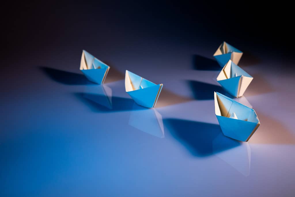 Origami paper boats. Origami is a one of the creative productive activities for university students.
